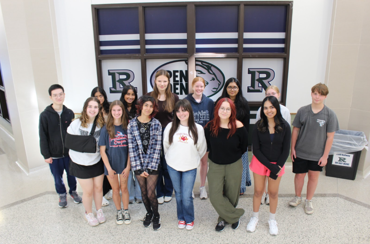 The 2024-2025 Newspaper team takes a photo together. This is the tenth year of OPENDen reporting on school activities.